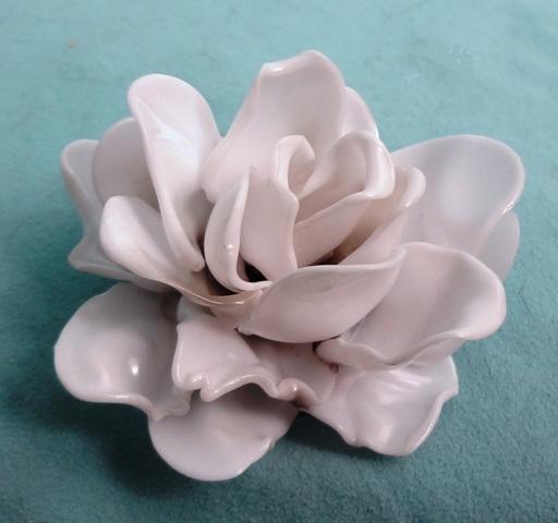 Rosa de plastico Colheres